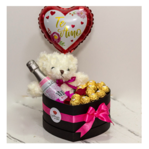 caja de regalo con espumante , peluche y globo.
