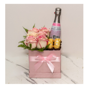 caja de regalo con espumante y bombones.